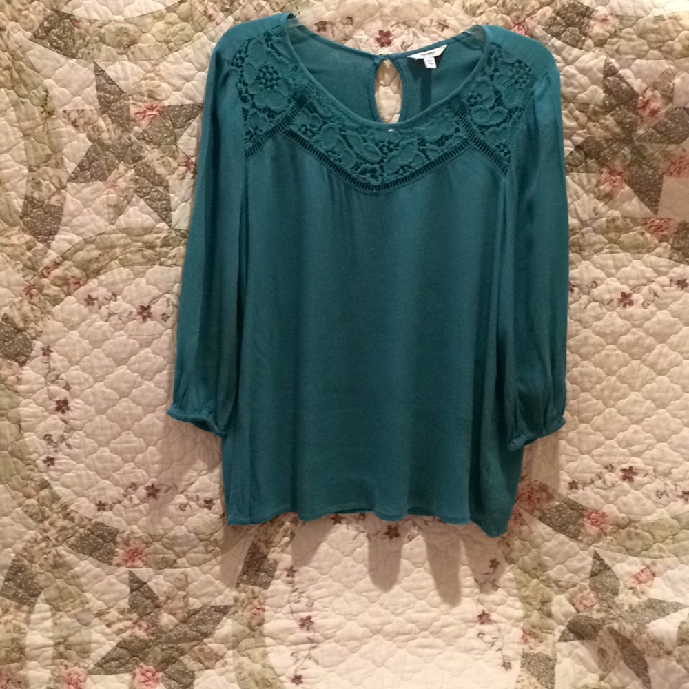 Jade green tunic with lace neckline